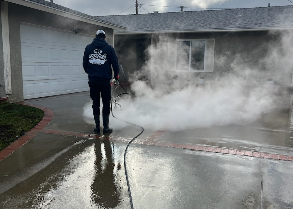 Pressure washing a driveway